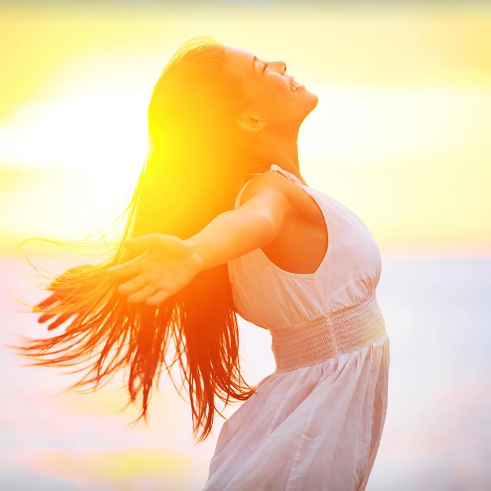 Photo of Young Woman Embracing The Sunshine